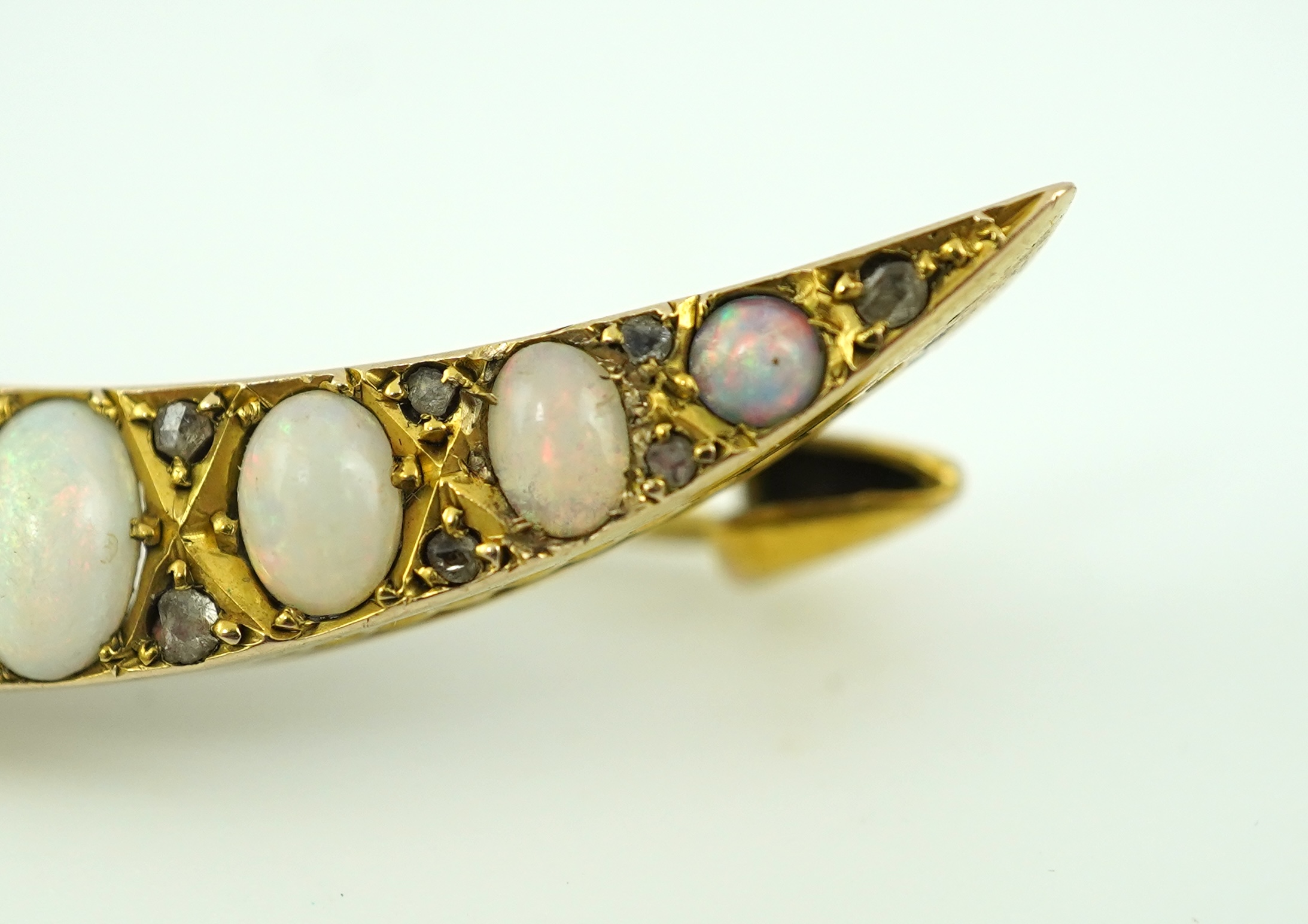 An opal and diamond brooch, early 20th century